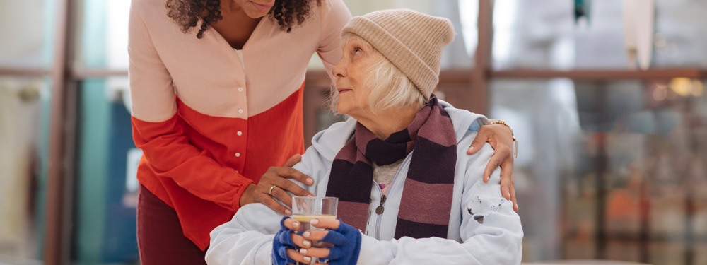 elderly woman with carer